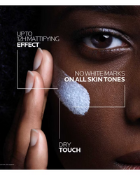 La Roche Posay Anthelios UVMune Oil Control fluid spf50+ 50ml being applied with text showing Mattifying effect, no white marks on all skin tones and dry touch