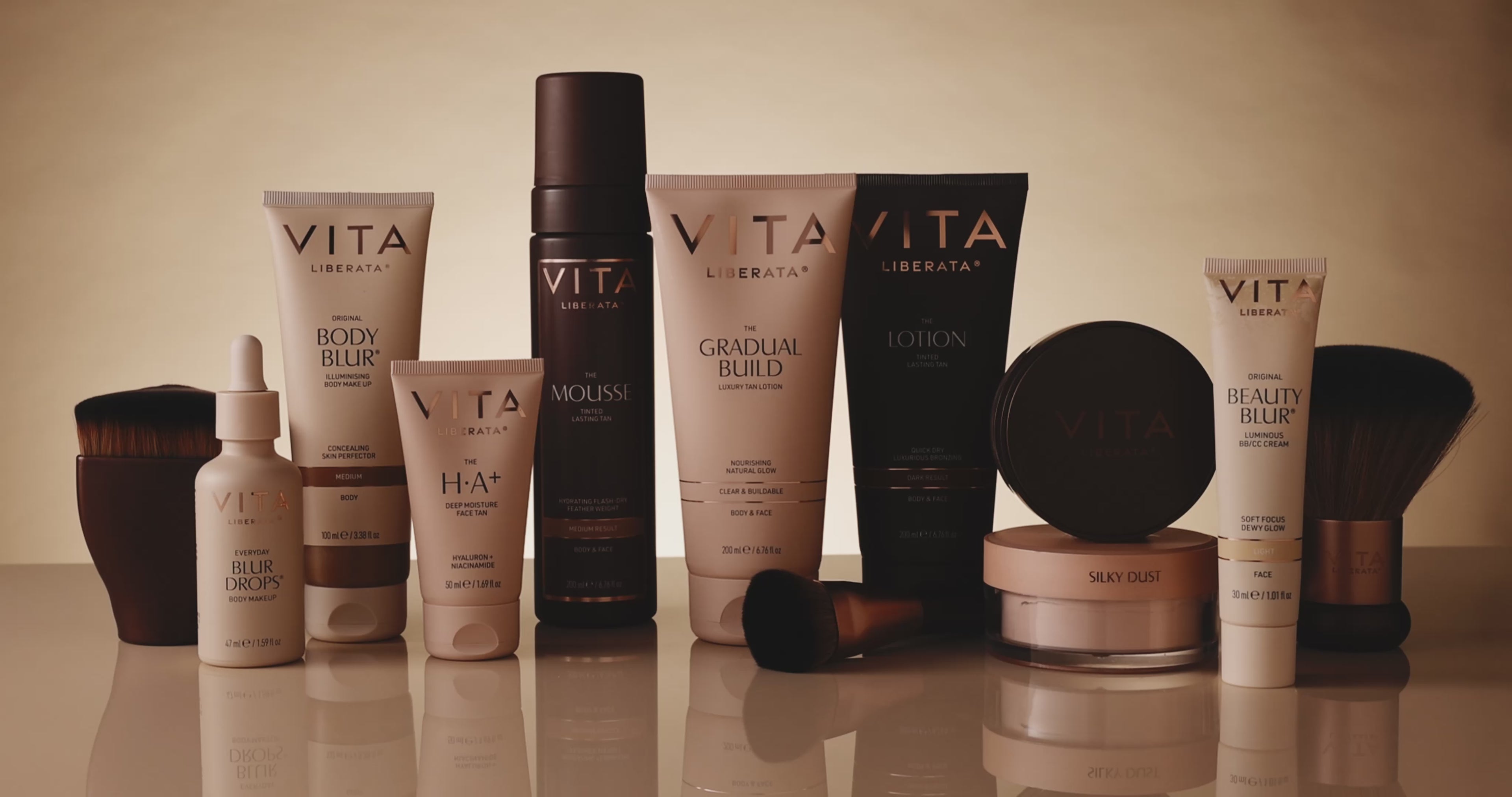 Video of the New Vita Liberata branded products with the Face Tanning Brush shown lay surrounded by other products