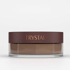 Jar of bronzing powder with 'TRYSTAL' branding on a white background